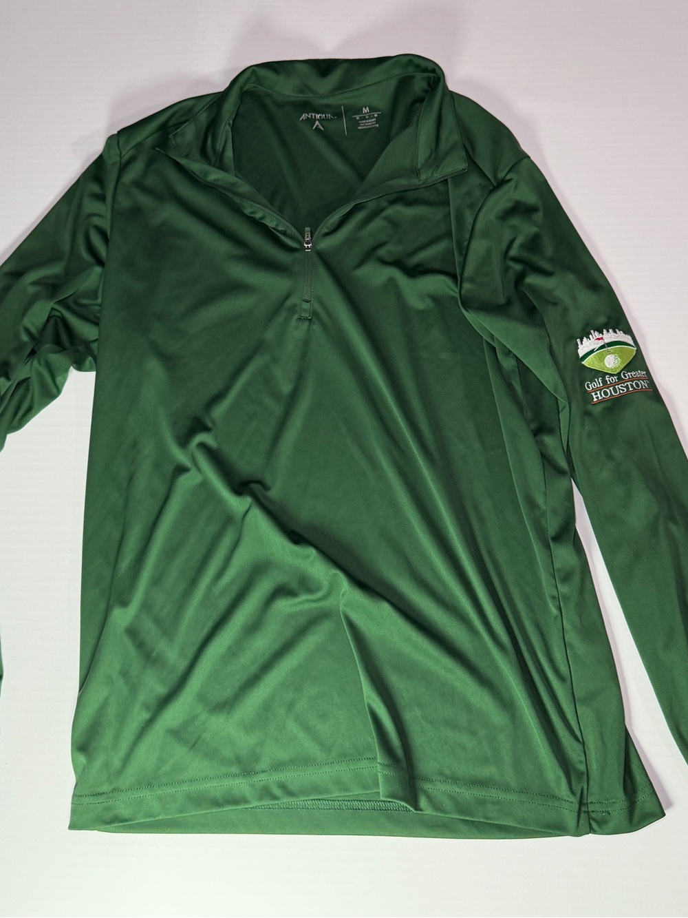 Golf for greater Houston Antigua Green Performance Polo with Logo Print